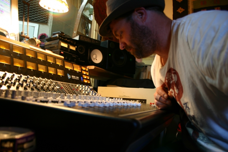 A photo of Gregory Howe at the sound board.