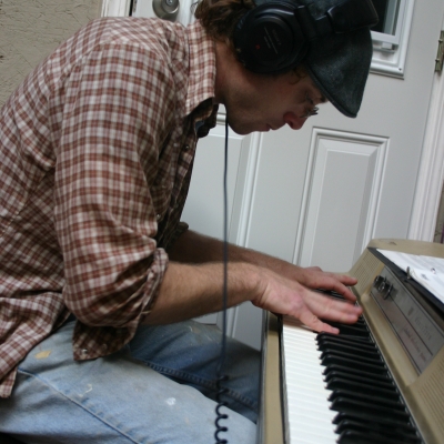 A photo of Matt Montgomery at the Piano.