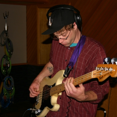 Matt Montgomery playing bass on the album "Throttle Elevator Music."